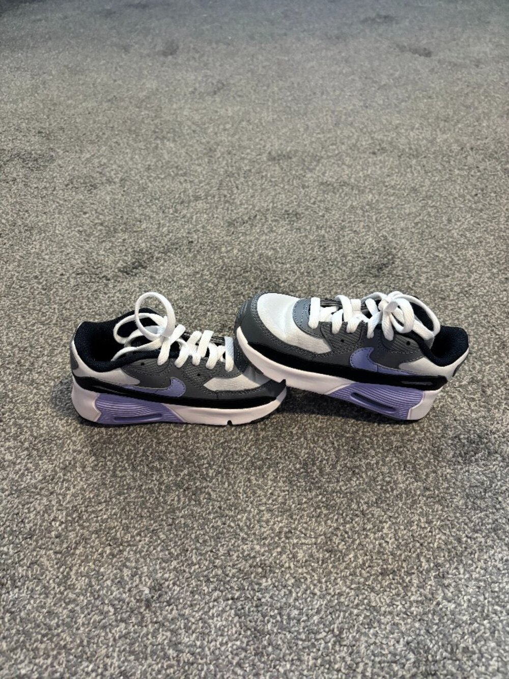 Nike purple, black and white tie tennis shoes